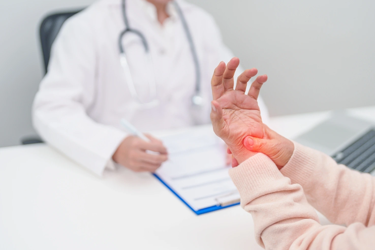 Doctor discussing a gout research study with a patient