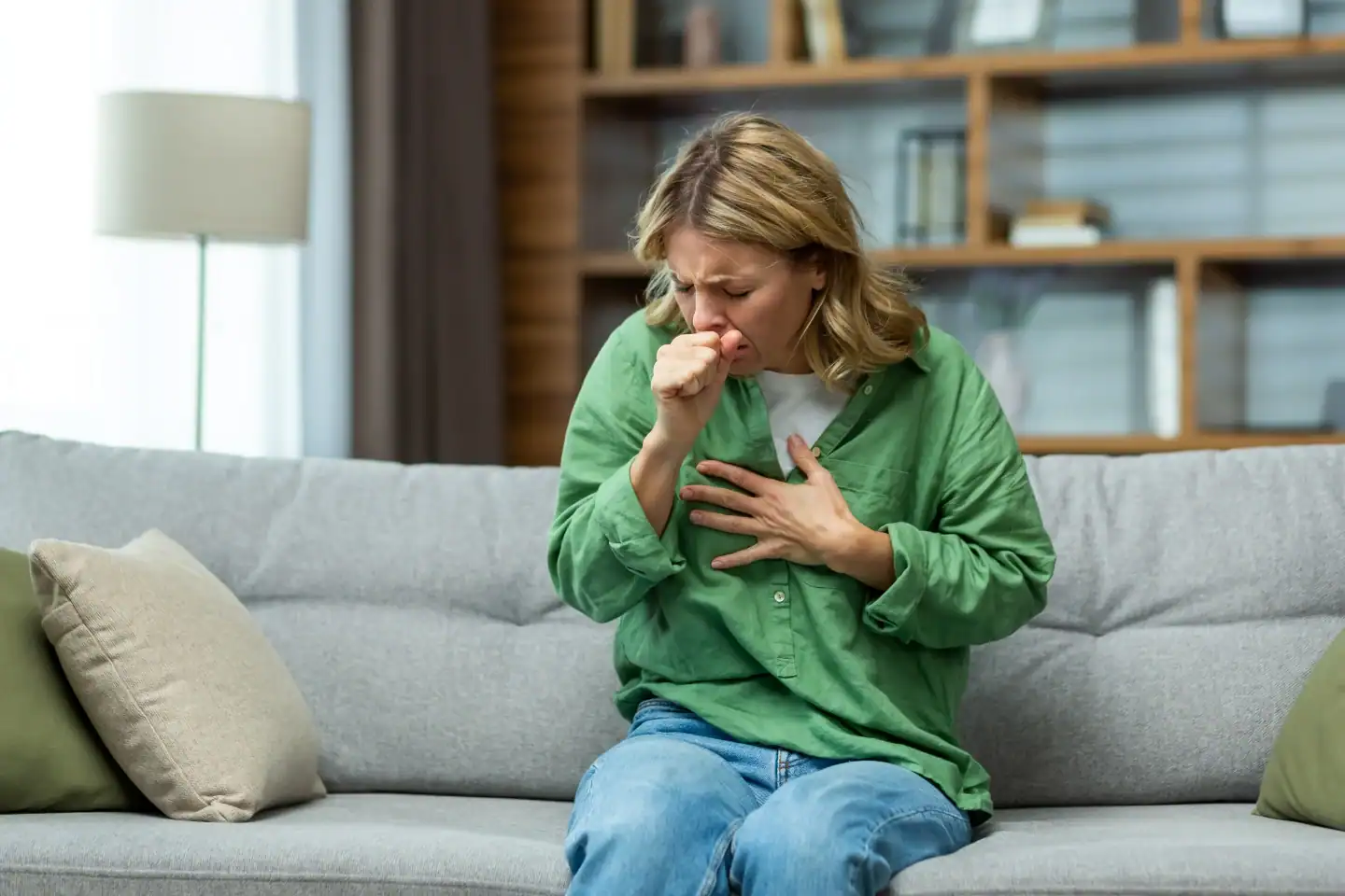 Woman with symptoms who may qualify for a whooping cough research study